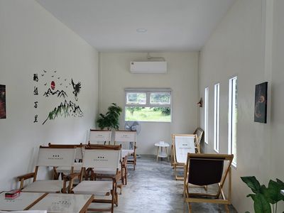 Empty wooden floor of a modern fitness studio space.