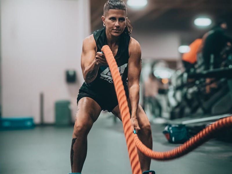 Professional gym equipment arranged for a circuit training session.